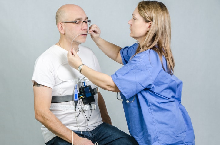 Doctor Preps Patient for Sleep Study